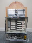 A WURLITZER STEREOPHONIC CHROME WALLBOX, on a later wooden back plate (No key)