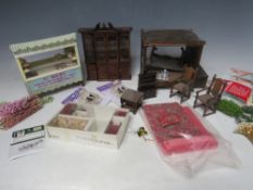 A SMALL TRAY OF DOLLS HOUSE FURNITURE, to include a four poster bed, table and chairs, dresser, wall