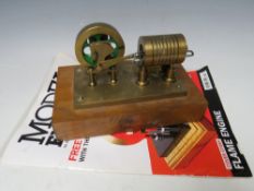 A FLAME / VACUUM ENGINE ON WOODEN PLINTH, with build plans