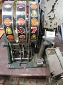 A VINTAGE ARISTOCRAT THREE REEL MECHANISM, set for 5p / shilling