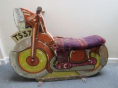 A FAIRGROUND PAINTED WOOD CAROUSEL MOTORBIKE, with polychrome decoration, on metal bracket stand,