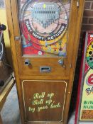 A RUFFLER AND WALKER FLOOR STANDING FOUR IN ONE PENNY SLOT MACHINE, consisting of two 'Whats My