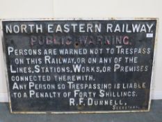 A LARGE 'NORTH EASTERN RAILWAY PUBLIC WARNING' CAST IRON SIGN, single sided, approx. 60 x 91 cm