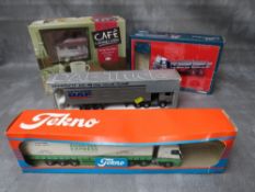 FOUR BOXED DIE CAST VEHICLES, to include 1:50 scale Tekno Road & Sea Express articulated lorry and