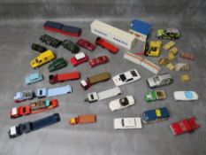 A TRAY OF UNBOXED DIE CAST, to include mainly Corgi examples, together with some lorry trailer backs