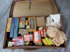 A LARGE LEATHER CASE FULL OF VINTAGE MAGIC TRICKS