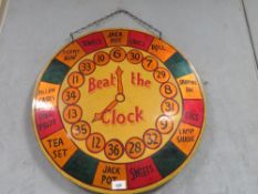 A VINTAGE WOODEN 'BEAT THE CLOCK' CIRCULAR GAME BOARD, Dia. 56 cm