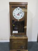 A VINTAGE SIMPLEX OAK CASED ELECTRIC CLOCKING IN CLOCK A/F, H 115 cm