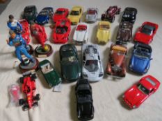 A COLLECTION OF UNBOXED DIE CAST CARS AND FIGURES, cars mainly 1:18 scale by Burago, Maisto etc.,