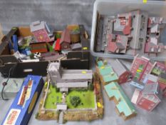 THREE TRAYS OF 00 GAUGE RAILWAY LAYOUT BUILDINGS, platforms and scenery, together with a transformer