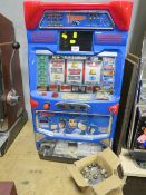 A JAPANESE ELECTRONIC 'THUNDERBIRDS' THREE REEL TABLE TOP FRUIT MACHINE, set for token operation,