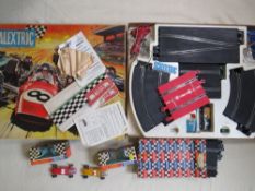 A BOXED SCALEXTIC SET CLUB 60, together with two boxed Scalextric cars and a box of track