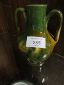 A TWIN HANDLED DRIP GLAZE VASE STAMPED F.P.P. ? VALLAURIS FRANCE