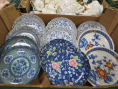 A BOX OF ORIENTAL PLATES