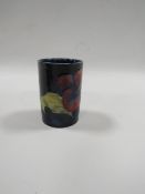 A SMALL MOORCROFT SLEEVE VASE