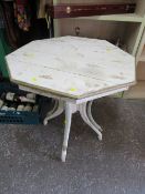 A VINTAGE PAINTED OCTAGONAL TABLE