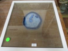 A GLASS FRAMED BLUE AGATE SLICE