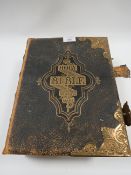 A BRASS BOUND BIBLE WITH ILLUSTRATIONS AND MAPS