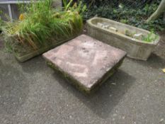 TWO CONCRETE PLANT TROUGHS AND A PLANTER BASE
