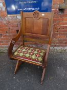 A LARGE CARVED OAK ECCLESIASTICAL ARMCHAIR - 'ST MARYS ABBEY'
