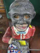 A NOVELTY METAL MONEY BOX