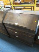 A 19TH CENTURY OAK COUNTRYMADE BUREAU - 'ST MARYS ABBEY'