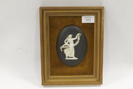 A VINTAGE FRAMED WEDGWOOD BLACK JASPERWARE DANCING HOURS PLAQUE