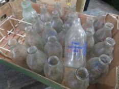 A QUANTITY OF RETRO GLASS EMPTY MILK BOTTLES