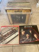 APPROXIMATELY 50 LP RECORDS AND 12