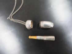 AN UNUSUAL EXTENDING CHEROOT HOLDER IN CASE MARKED, 900