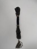 A GEORGIAN PURSE WITH CUT STEEL DECORATION