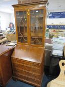 A YEW WOOD BUREAU BOOKCASE