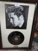 A FRAMED ELVIS PRESLEY 7