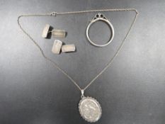 A LARGE ENGRAVED SILVER LOCKET, CUFFLINKS ETC