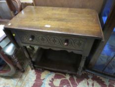 A CARVED OAK SINGLE DRAWER DROPLEAF HALL TABLE W-123 CM