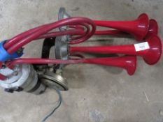 A SET OF FOUR TONE AIR HORNS