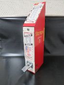 A VINTAGE METAL POSTAGE STAMPS VENDING MACHINE