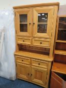 A MODERN GLAZED OAK DRESSER - 190 X 96 CM