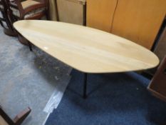 A MODERN OAK SHAPED COFFEE TABLE ON THREE METAL LEGS