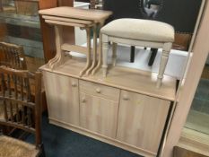 A modern limed style sideboard together with nest of tables and stool
