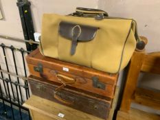 Two vintage leather suitcases together with a chaps hold all