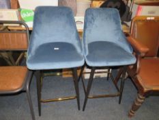 A pair of modern upholstered kitchen / barstools