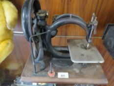 A VINTAGE WILCOXS & GIBBS SEWING MACHINE A/F