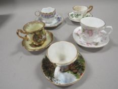 A TRAY OF 20 MINATURE CUPS AND SAUCERS TO INCLUDE WEDGWOOD, LIMOGES ETC
