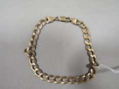 A HALLMARKED 9 CARAT GOLD FLAT LINKED BRACELET approx weight 14.4 g