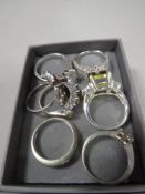 SIX HALLMARKED SILVER DRESS RINGS TOGETHER WITH ONE WHITE METAL DRESS RING (7)