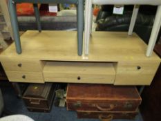 A modern office desk with five drawers