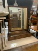 A Victorian mahogany dressing mirror with two drawers