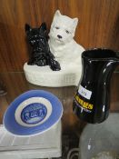 A VINTAGE BLACK & WHITE WHISKY CERAMIC BOTTLE DISPLAY STAND TOGETHER WITH A LANGS WATER JUG AND A