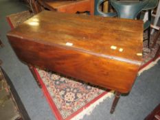 An antique mahogany Pembroke table